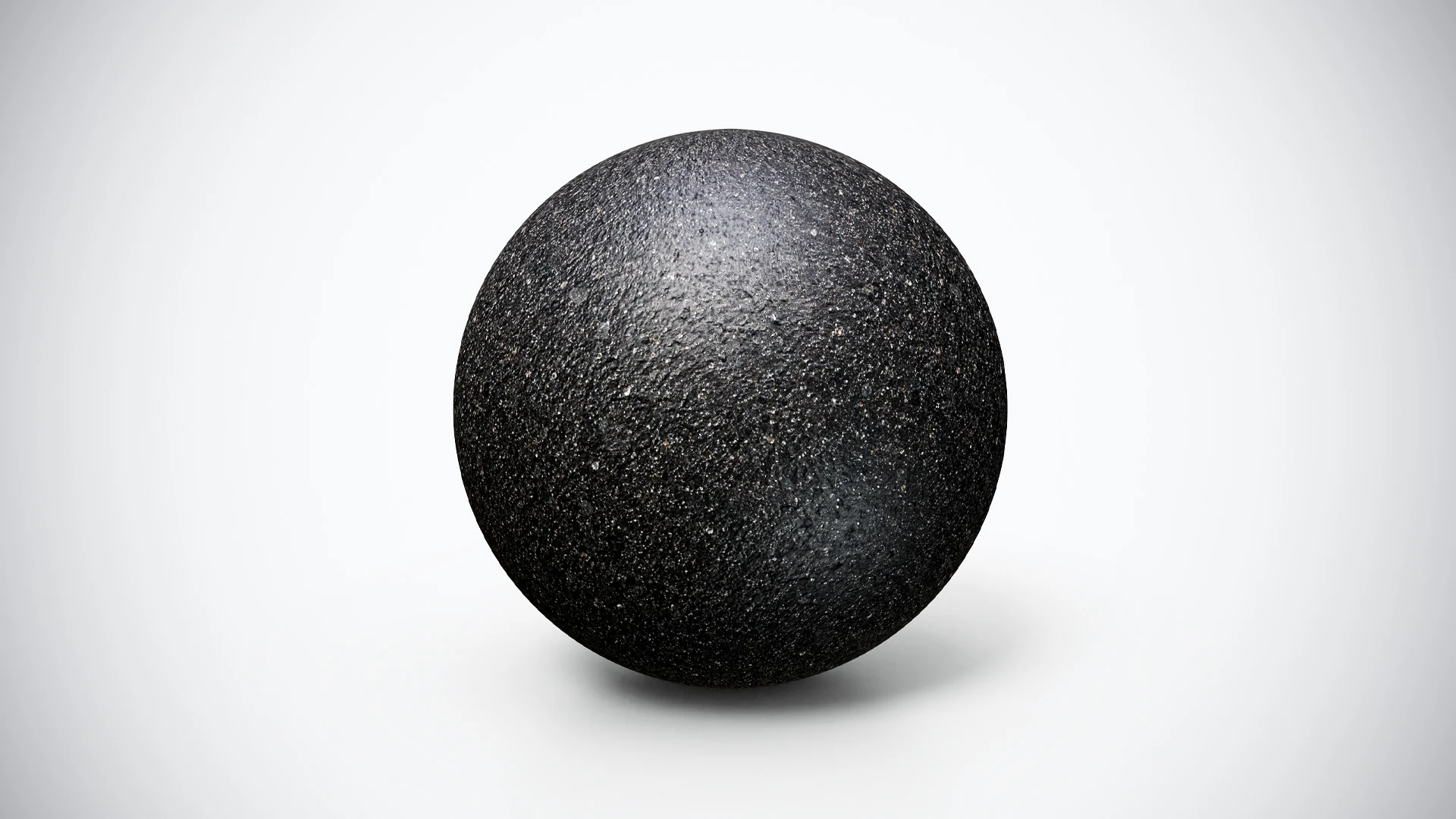 Deep black basalt PBR material on a preview sphere, with dense granular detail, scattered pale flecks and a textured highlight